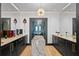 Elegant wine cellar with marble countertops, custom cabinets, and a wine fridge at 449 S 12Th St # 2702, Tampa, FL 33602