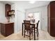 Bright dining area features lots of cabinet storage with an eat in table at 470 Hibiscus N Ln, Dunedin, FL 34698
