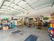 Large garage with high ceilings offering plenty of storage and workspace at 470 Hibiscus N Ln, Dunedin, FL 34698