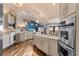 Kitchen with seating and view of living and dining areas at 6605 Seabird Way, Apollo Beach, FL 33572