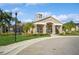 Elegant clubhouse featuring classic architectural details and lush landscaping at 7001 Interbay Blvd # 181, Tampa, FL 33616
