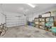 Spacious two car garage with storage, bicycles, and room for projects at 704 Winterside Dr, Apollo Beach, FL 33572