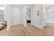Bright hallway with a view of the bedroom and bathroom, highlighting the home's layout at 704 Winterside Dr, Apollo Beach, FL 33572