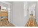 Bright hallway with lots of natural light from large window at 704 Winterside Dr, Apollo Beach, FL 33572