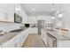 Updated kitchen with granite countertops, stainless steel appliances, and ample cabinet space at 704 Winterside Dr, Apollo Beach, FL 33572