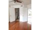 This bedroom features an ensuite bathroom with a walk-in shower and a double door entryway at 8728 Mallard Reserve Dr # 102, Tampa, FL 33614