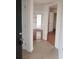 Inviting entryway with tile floors leading to hardwood floors and a bright living space at 8728 Mallard Reserve Dr # 102, Tampa, FL 33614