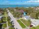 Beautiful waterfront home with mature trees and lush landscaping, near the bay with stunning views at 1044 Charles St, Clearwater, FL 33755