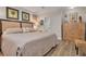 Cozy bedroom featuring neutral walls, wood-look floors, and natural lighting at 1044 Charles St, Clearwater, FL 33755