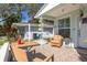 Inviting front porch with comfortable seating, decorative accents, and a welcoming entrance at 1044 Charles St, Clearwater, FL 33755
