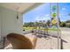 Inviting front porch with comfortable seating, decorative accents, and a serene outdoor view at 1044 Charles St, Clearwater, FL 33755