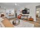 Bright and airy living room with an open floor plan, seamlessly connecting to the modern kitchen at 1044 Charles St, Clearwater, FL 33755