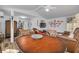 Bright sun room with wood-look floors, a ceiling fan, and lots of natural light at 1044 Charles St, Clearwater, FL 33755