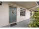 Close-up of the front door and entryway of the condo at 11800 Park Blvd # 505, Seminole, FL 33772