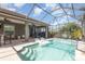 A screened in pool area with steps into the water and two white loungers at 11930 Perennial Pl, Bradenton, FL 34211