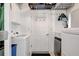 Convenient laundry room with modern washer and dryer, plus storage and hanging space at 1389 47Th Ne Ave, St Petersburg, FL 33703