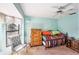 Cozy bedroom showcases a decorative bay window and neutral blue walls at 15 Emerald Bay Dr, Oldsmar, FL 34677