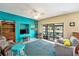 Cozy living room with vibrant walls and a sliding glass door leading to the outdoors at 15 Emerald Bay Dr, Oldsmar, FL 34677