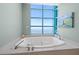 Bathroom close up of the soaking tub and ocean view at 1560 Gulf Blvd # 1202, Clearwater Beach, FL 33767