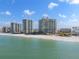 Exterior of beachfront condos along the shoreline, with beautiful views of the ocean and sandy beach at 1560 Gulf Blvd # 1202, Clearwater Beach, FL 33767
