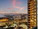 Dusk view of the condo tower, the waterway, and the surrounding neighborhood at 1560 Gulf Blvd # 1202, Clearwater Beach, FL 33767