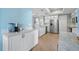 Bright kitchen with white cabinetry, stainless steel appliances, and elegant countertops at 1560 Gulf Blvd # 1202, Clearwater Beach, FL 33767