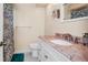 Bathroom featuring a vanity with a marble countertop at 1662 S Lake Ave # 2, Clearwater, FL 33756