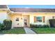 Charming home exterior with manicured lawn and a welcoming front entrance at 1662 S Lake Ave # 2, Clearwater, FL 33756