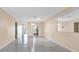 The living room boasts tile flooring, neutral-colored walls, and modern lighting at 1662 S Lake Ave # 2, Clearwater, FL 33756