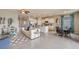 Inviting living room with a large sofa, glass table, and stylish decor at 17061 James Trl, Parrish, FL 34219