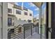 A balcony offers an outdoor view of the other units, a metal railing, and a gray floor at 1801 N Morgan St # 6, Tampa, FL 33602
