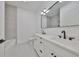 Modern bathroom with double sinks, gray tile accent wall, and shower at 1801 N Morgan St # 6, Tampa, FL 33602