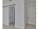 Hallway features a black sliding door and white doors with black handles at 1801 N Morgan St # 6, Tampa, FL 33602