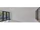 Bright living room with large doors offering abundant natural light and neighborhood views at 1801 N Morgan St # 6, Tampa, FL 33602