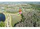 The aerial perspective shows this home's lake access and verdant backyard at 19238 Climbing Aster Dr, Tampa, FL 33647