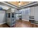 Bedroom featuring bunk beds, fan and unique custom ceiling design at 19238 Climbing Aster Dr, Tampa, FL 33647