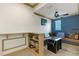 Cozy game room features a built-in bench, game table and shelving at 19238 Climbing Aster Dr, Tampa, FL 33647
