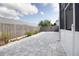 Spacious outdoor patio area featuring stone pavers and a fenced backyard at 2166 Andrews Ct, Dunedin, FL 34698