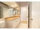 Bathroom featuring tile floors, a granite vanity, and a toilet at 2166 Andrews Ct, Dunedin, FL 34698