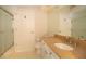 Clean bathroom featuring tile floors, a granite vanity, a shower, and a toilet at 2166 Andrews Ct, Dunedin, FL 34698