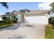 Charming single-story home with well-maintained landscaping and a two-car garage at 2166 Andrews Ct, Dunedin, FL 34698
