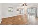 Inviting living room with a view of the screened lanai at 2301 Grenoble Pl # 1, Sun City Center, FL 33573