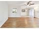 Bright and spacious living room with laminate flooring and natural light at 2301 Grenoble Pl # 1, Sun City Center, FL 33573