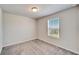 Bedroom with carpet, natural light, and a neutral color scheme at 3204 Fresno Pl, Zephyrhills, FL 33541