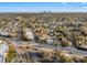 Expansive aerial shot featuring a home near downtown Tampa with lush surrounding greenery and bright blue skies at 3721 Iris N St, St Petersburg, FL 33704