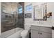 This bathroom features a bathtub and shower, a stylish mirror, and a modern vanity at 3721 Iris N St, St Petersburg, FL 33704