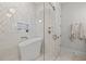 Luxury bathroom with modern free-standing tub and decorative marble tiled walls at 3721 Iris N St, St Petersburg, FL 33704