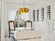 Bright dining area featuring a unique wine rack, stylish lighting fixture, and comfortable seating at 3721 Iris N St, St Petersburg, FL 33704
