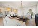 Stylish living room with hardwood floors, comfortable sofas, and modern light fixtures at 3721 Iris N St, St Petersburg, FL 33704