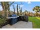 This outdoor kitchen features stainless steel grill and ample counter space for entertaining at 3721 Iris N St, St Petersburg, FL 33704